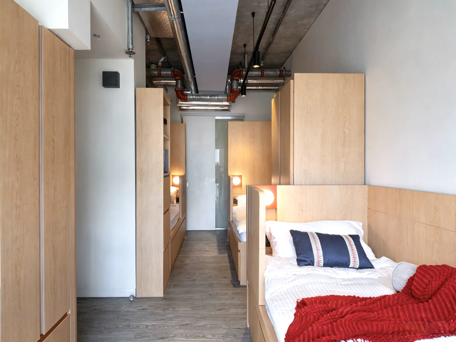 Classic Triple student room at Stride co-living, Wong Chuk Hang, Hong Kong