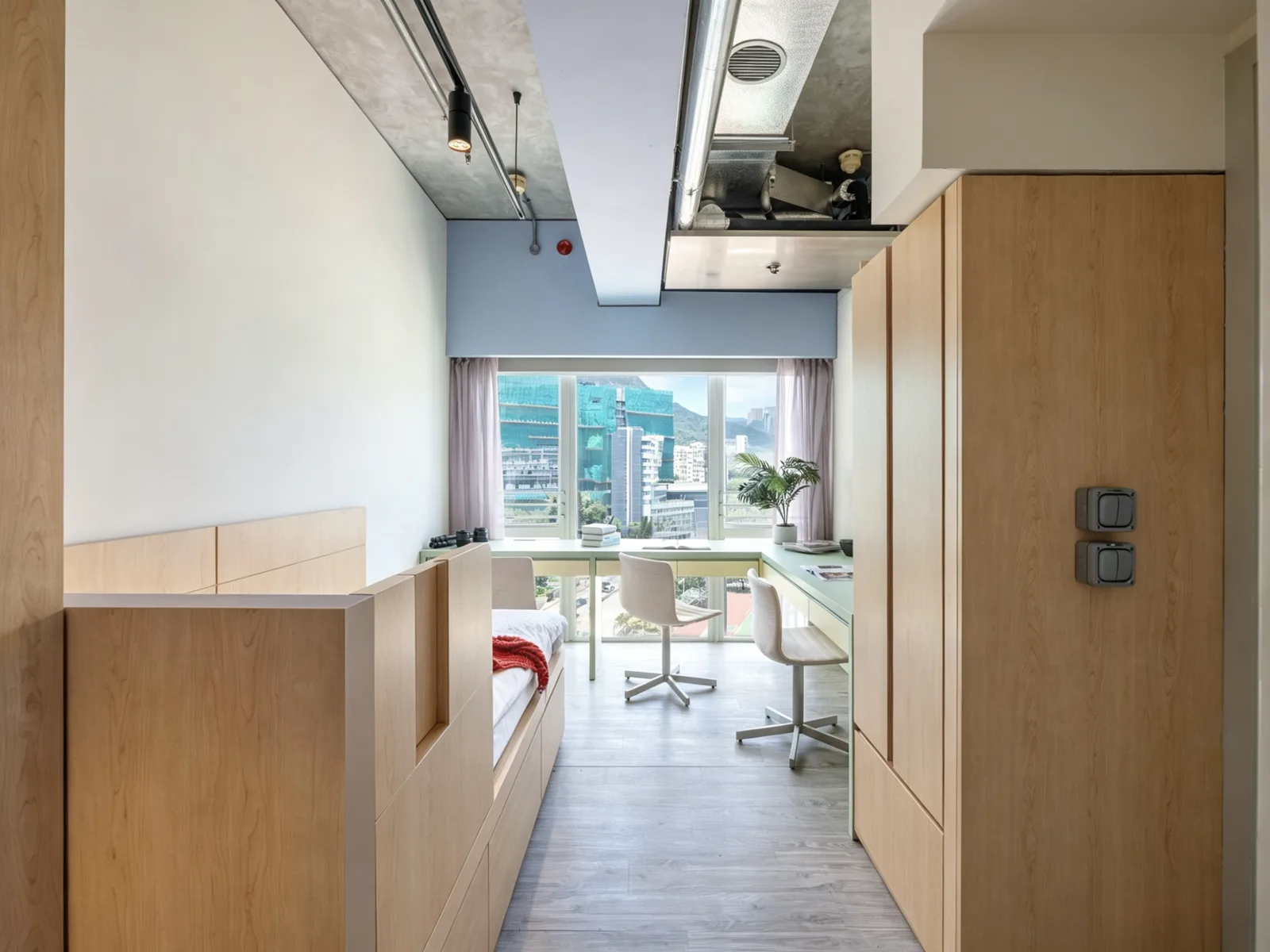 Classic Triple student room at Stride co-living, Wong Chuk Hang, Hong Kong
