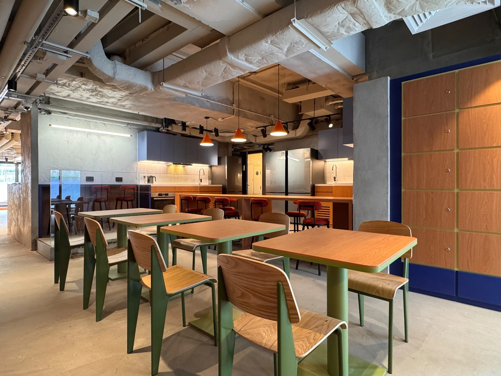 Dining area at Stride student co-living, Wong Chuk Hang, Hong Kong