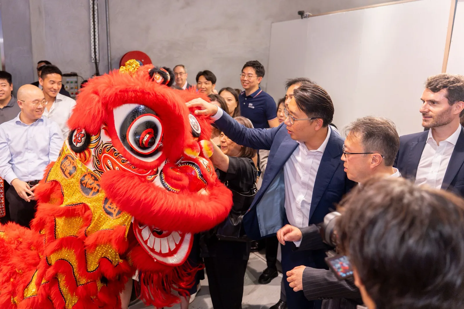 Guests at the lion dance eye-dotting ceremony marking the opening of Stride Wong Chuk Hang